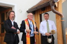 Priester mit Ministranten